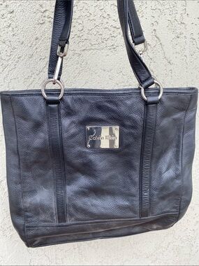 Calvin Klein Black Pebbled Leather Tote with Silver Plaque